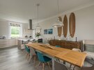 Dining area, The Beach House - Open-plan dining and kitchen area, with large table seating up to 10 guests