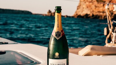 Bollinger Wine Bottle On Boat - Take a boat trip around Gozo (© 2019, Sebastian Coman)