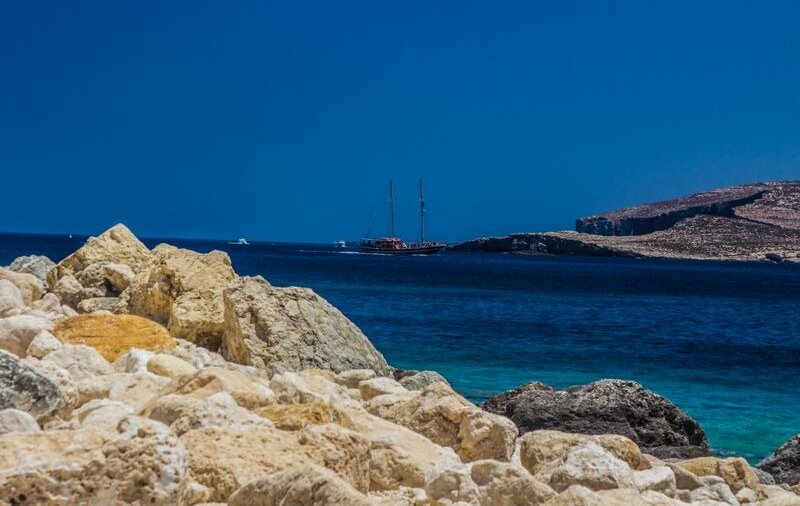 Marsalforn - Holidays to Gozo are great for a tranquil sail on the sea and for exploring the island caves.