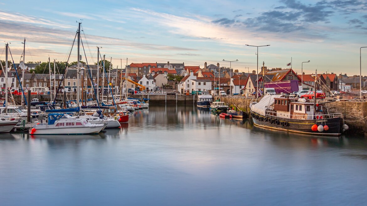 Visiting Fife in Scotland - Anstruther harbour under blue skies. (© Neil and Zulma Scott)