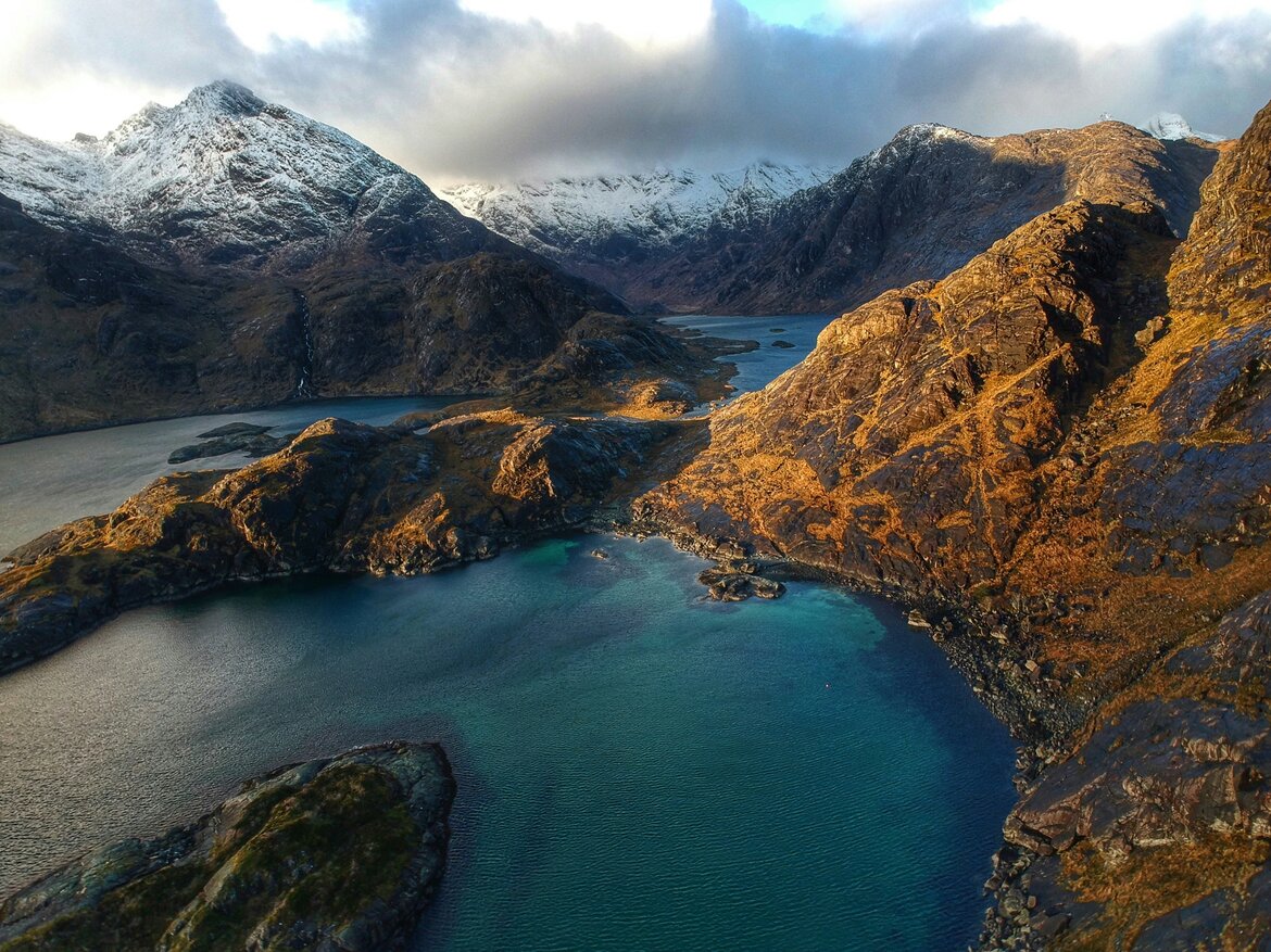 Sea Loch in the black Cuillin mountains - A hidden sea Loch in the black Cuillin mountains (© Photo by K B on Unsplash) Sea Loch in the black Cuillin mountains - A hidden sea Loch in the black Cuillin mountains (© Photo by K B on Unsplash)