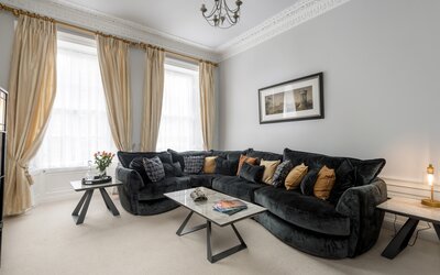 Bright Lounge Area with High Speed Internet - An alternate angle of the grand living space, highlighting a massive and inviting seating arrangement designed for ultimate relaxation