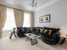 Bright Lounge Area with High Speed Internet - An alternate angle of the grand living space, highlighting a massive and inviting seating arrangement designed for ultimate relaxation
