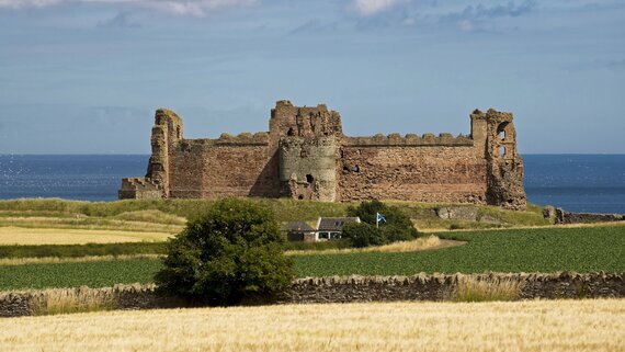 Tantallon Castle in North Berwick - Ruins of 14th century castle surrounded by fields and sea.
