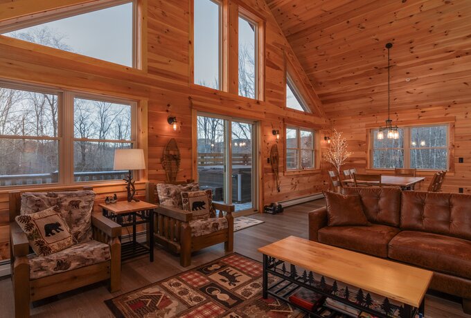 Living Area - Open concept living room / dining area, with access out to the deck with hot tub.