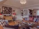 Cosy Lounge with Light Grey and Warm, Brown Touches - Stylish lounge area with comfortable sofas, to unwind after a long day in the city of Edinburgh Cosy Lounge with Light Grey and Warm, Brown Touches - Stylish lounge area with comfortable sofas, to unwind after a long day in the city of Edinburgh