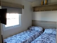 Twin Bedroom with TV