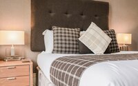 20-web-or-mls-242 West George Street MacKintosh Apartment_20 - Stylish bedroom offering a peaceful retreat