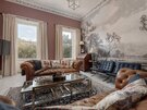 Elegant Living Room with Castle Views - A bright and spacious living area featuring large windows framing breath-taking views of Edinburgh Castle. Designed with luxury in mind, the space combines modern comfort with timeless style - perfect for relaxing after a day exploring the city