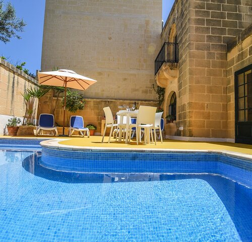 1. Outdoor area with private pool and BBQ