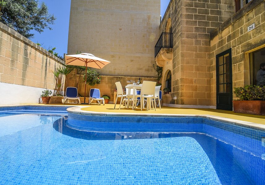 1. Outdoor area with private pool and BBQ