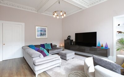 Living room - Family living room with comfortable L shaped sofa and flat screen TV