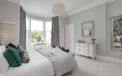 Spacious Bedroom in Luxury Self-Catered Townhouse - White and grey super king size bedroom with elegant décor