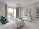 Spacious Bedroom in Luxury Self-Catered Townhouse - White and grey super king size bedroom with elegant décor