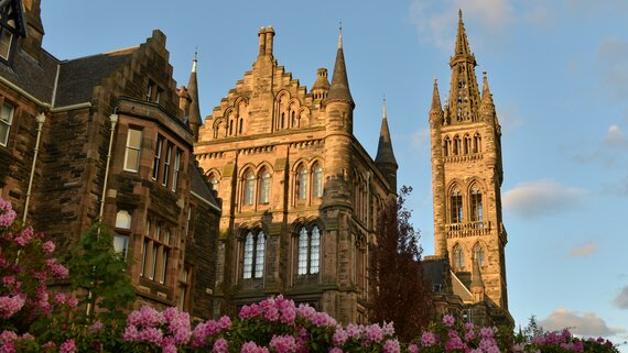 Glasgow University - Glasgow University building in the West end, pictured in Spring with blossom (© Photo by Paulina B on Unsplash)