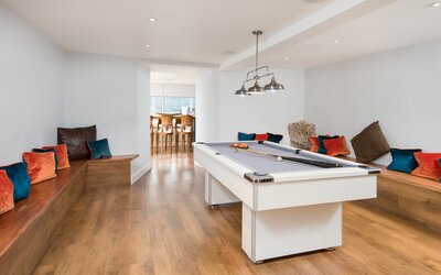 Game Room in a Self-Catered Home - Inviting living room, featuring a pool table and seating area