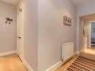 Dean Path 7 - Hallway with stripy rug and view to double bedroom