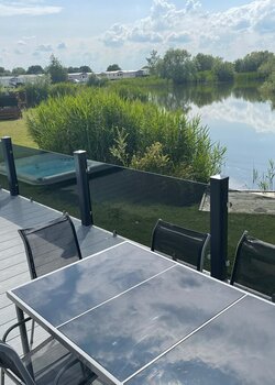 Hot tub, lake view - Balcony lake view with hot tub and private fishing peg