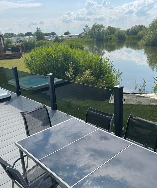 Hot tub, lake view - Balcony lake view with hot tub and private fishing peg