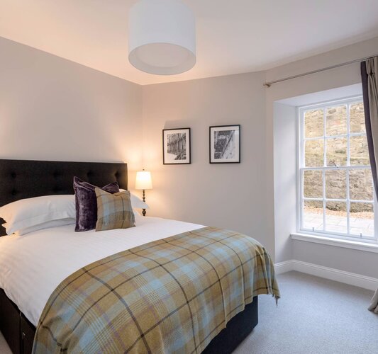 Stafford Street Apartment Master Bedroom - Master Bedroom with kingsize bed and tartan throw in Edinburgh West End Apartment.