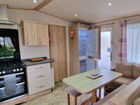 Kitchen and Dining Areas with Fridge Freezer