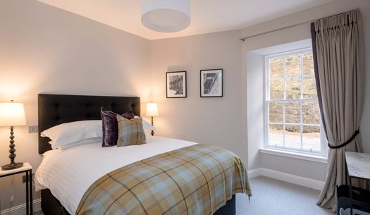 Stafford Street Apartment Master Bedroom - Master Bedroom with kingsize bed and tartan throw in Edinburgh West End Apartment.
