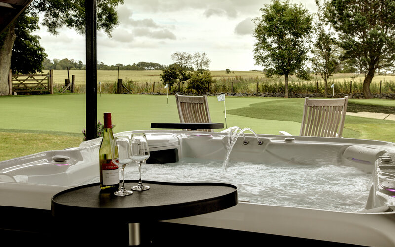 Private Hot Tub in a Vacation Rental - Luxurious private hot tub, perfect for relaxation with serene surroundings and ultimate comfort