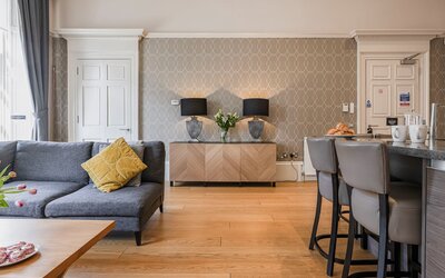 5-web-or-mls-242 West George Street MacKintosh Apartment_5 - Light-filled living room designed for comfort and calm