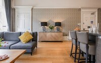 5-web-or-mls-242 West George Street MacKintosh Apartment_5 - Light-filled living room designed for comfort and calm