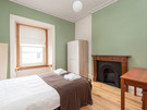 Lothian Road 3 - Double bedroom with traditional fireplace in Edinburgh holiday let