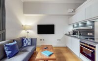 15-web-or-mls-242 West George Street Lomond_15 - Living area with comfortable seating and a flat-screen TV