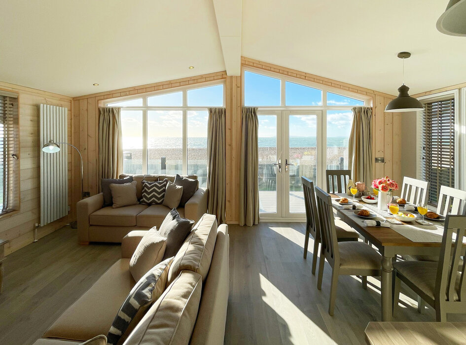 Living and dining space in Sunset Lodge, Selsey - Luxurious open plan living and dining space with a neutral colour tone.