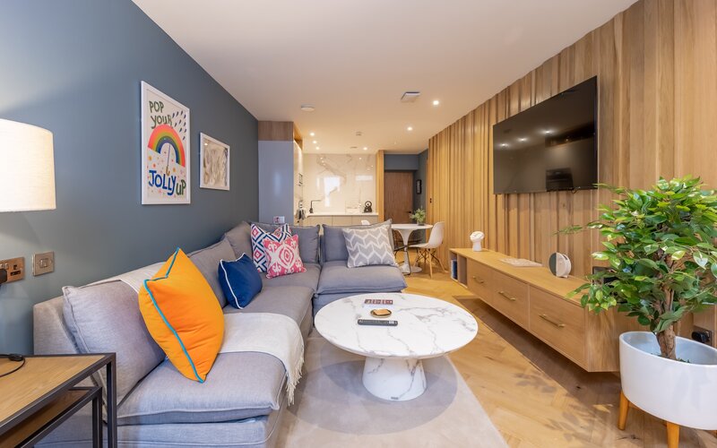 Living Room - Superb open-plan living room and a fully equipped kitchen with a clean, contemporary design.