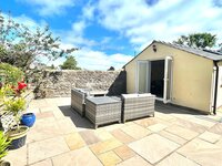 Private courtyard with seating.