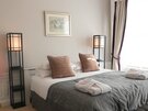 Elegant Bedroom Design – Relaxing Edinburgh Stay - Stylish furnishings and soft finishes create a calm retreat after a busy day in Edinburgh.