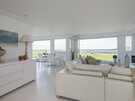 Clova Penthouse - living area - Open plan living area with large comfortable sofa at Clova Penthouse