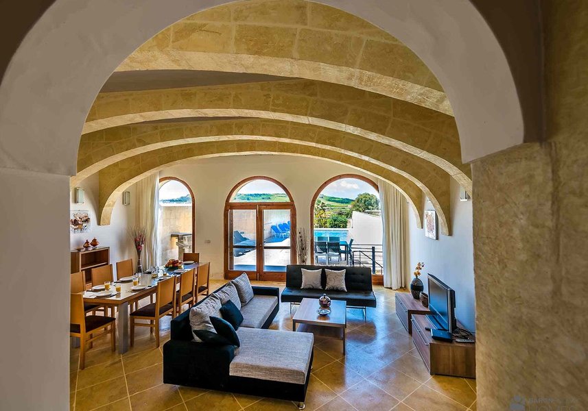 Lounge pool view in villa in Gozo