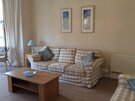 Spacious 2 bedroom holiday apartment in North Berwick just across from the beach - Comfortable sitting room (© Coast Properties)