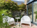 Seating area in garden in Scottish coastal town