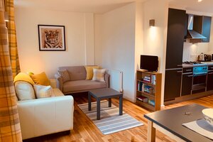 Cowgatehead 3 - Open plan living room, kitchen area in central Edinburgh holiday home.
