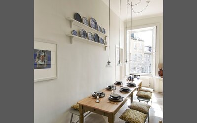 Banqueting Area For Business Travellers - Separate dining/banqueting room with a wooden table, stylish chairs and ambient lighting