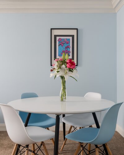 Dining Space within the Living Room - The bright open living and dining space comfortably seats four guests, making it perfect for shared meals, games evenings or planning your next Edinburgh adventure.