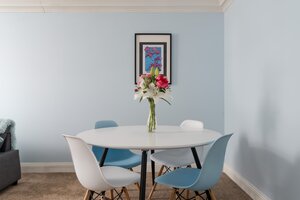Dining Space within the Living Room - The bright open living and dining space comfortably seats four guests, making it perfect for shared meals, games evenings or planning your next Edinburgh adventure.