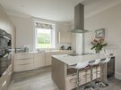 Kitchen, The Beach House - Stylish kitchen at The Beach House with breakfast bar and modern appliances