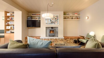 Living area - Bright, spacious open living area, feature a log burning stove, and log feature fire place in North Berwick holiday home.