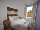 Self Catering holiday accommodation East Lothian - Master bedroom with double bed (© Coast Properties)