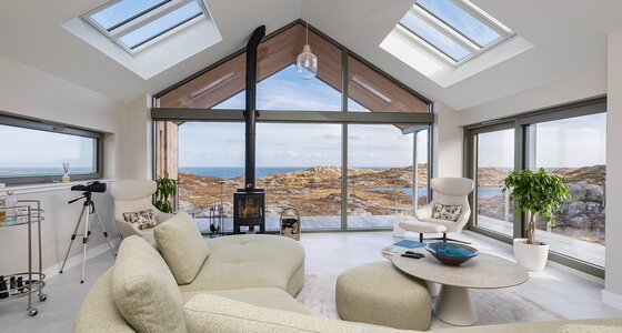 Open Plan Lounge in a Harris Holiday Home - Bright and stylish lounge area with comfortable sofas and breath-taking views