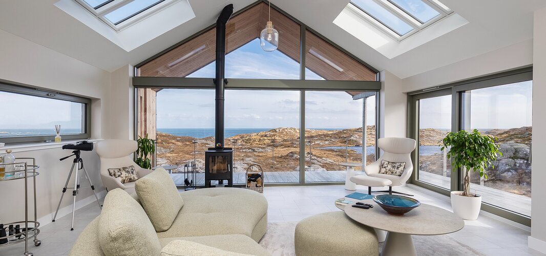 Open Plan Lounge in a Harris Holiday Home - Bright and stylish lounge area with comfortable sofas and breath-taking views