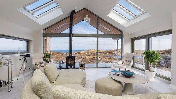 Open Plan Lounge in a Harris Holiday Home - Bright and stylish lounge area with comfortable sofas and breath-taking views