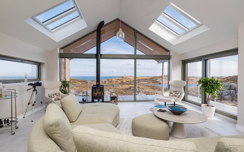 Open Plan Lounge in a Harris Holiday Home - Bright and stylish lounge area with comfortable sofas and breath-taking views